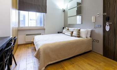 Apart Hotel Triple Room Picture with Bed and Sofa